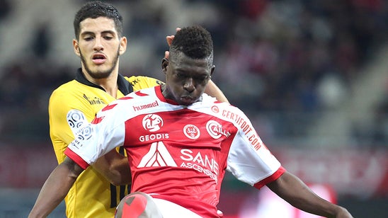 Reims trim PSG's lead atop Ligue 1 with home victory vs. Lille