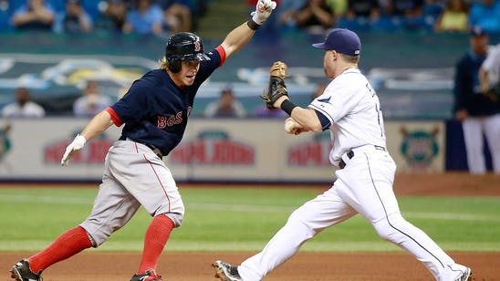 Holt's 10th-inning single lifts Red Sox over Rays