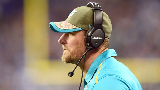 Who is Dolphins interim head coach Dan Campbell?