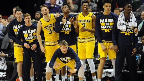 Michigan keeps tourney hopes alive with OT victory over Northwestern