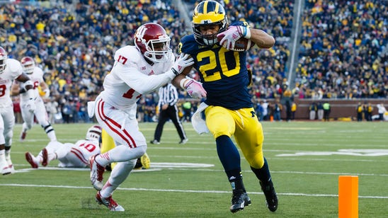 Michigan running back compares running style to feral cat