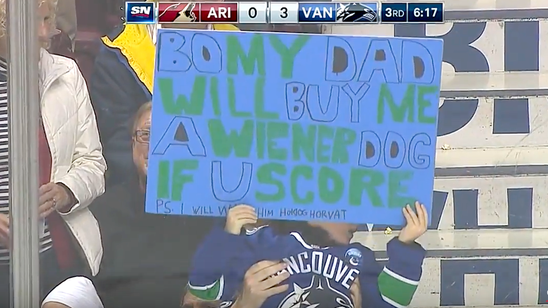 Canucks player scores to earn young fan a wiener dog
