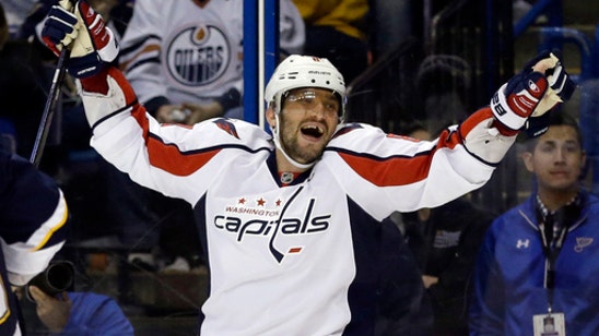 Ovechkin has hat trick for 50 goals, Holtby ties record with 48 wins