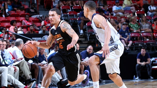 Booker paces summer Suns past Jazz
