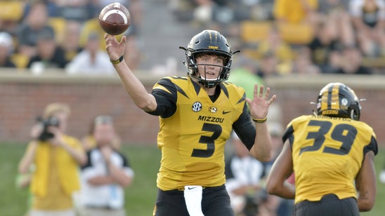 Lock wins battle of freshmen quarterbacks in Missouri victory