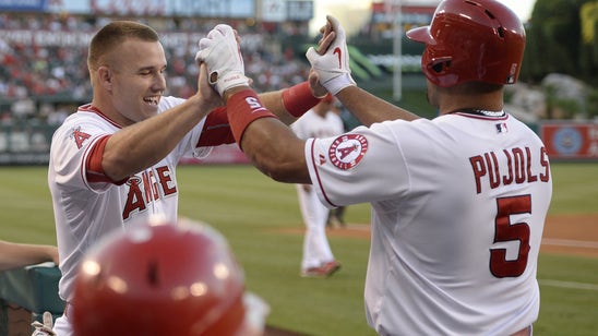 Why does Albert Pujols have a poster of Mike Trout in his bathroom?