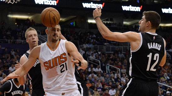 Nets finish strong to brush off Suns