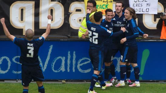 Bale helps Real Madrid overcome early scare to down Rayo