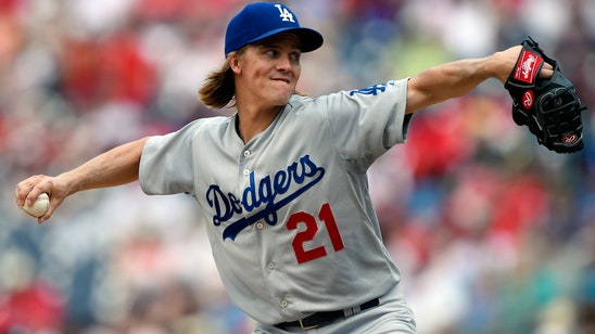 Dodgers' Greinke becomes first-time father, placed on paternity list