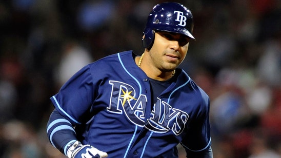 Former slugger Carlos Pena signs contract, retires as a Ray