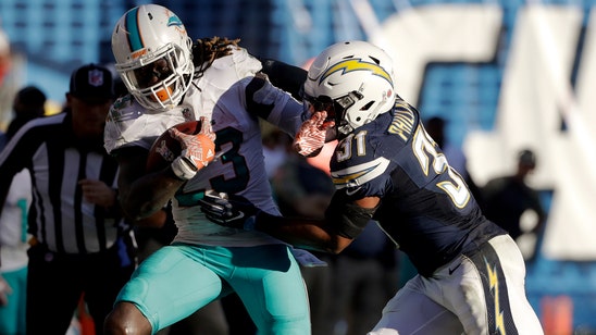 Defense steps up late, Dolphins top Chargers to extending winning streak