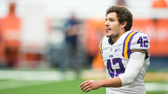 LSU kicker braves flooding in Louisiana in river waders