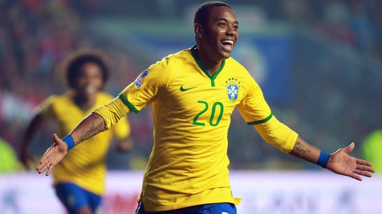 Brazil star Robinho completes move to Guangzhou Evergrande
