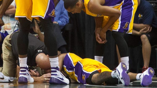 Pain in the butt turns Lakers rookie into crumpled heap on court