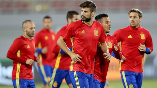 Pique to retire from Spain after '18 World Cup, cites fan furor over Catalonia stance