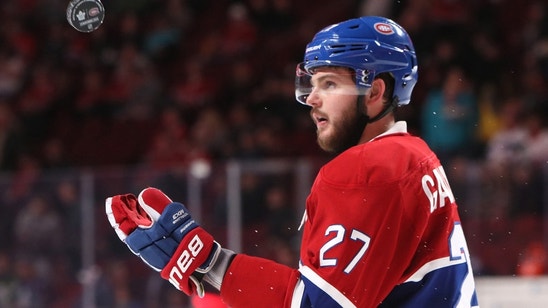 Canadiens' Alex Galchenyuk kisses crest after OT goal