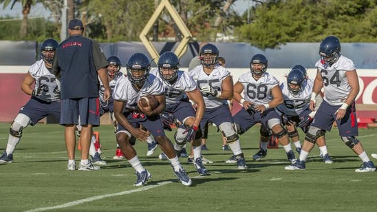 Arizona experimenting on offensive line after injury to center Wood