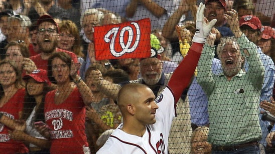 Danny Espinosa celebrates his 7-RBI night by slapping Jayson Werth's face