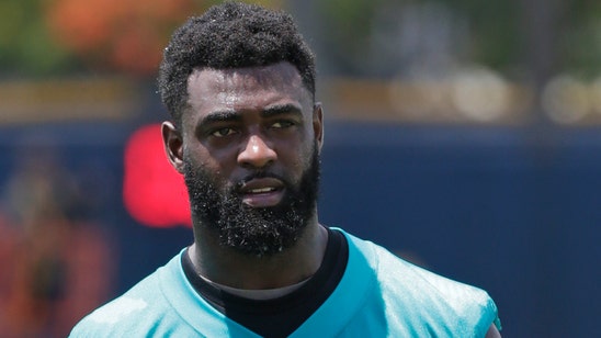 Reshad Jones back with Dolphins after skipping first day of minicamp