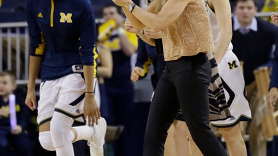 No. 8 Maryland holds off upset-minded Michigan 74-67