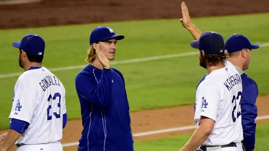 Kershaw urges Dodgers to 'keep the foot on the gas'