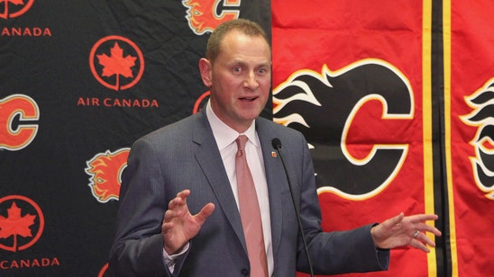 Flames GM Treliving wants team to keep heat on