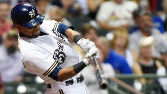 Brewers deal Davis to A's for pair of prospects