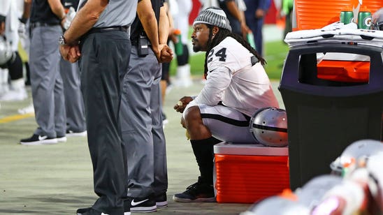 Marshawn Lynch sits for anthem prior to Cards' preseason win over Raiders