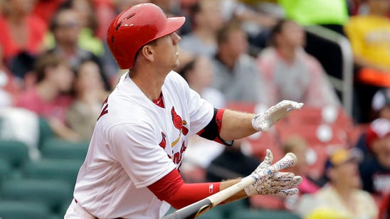 Cardinals fight through rain to beat Brewers, earn first home sweep