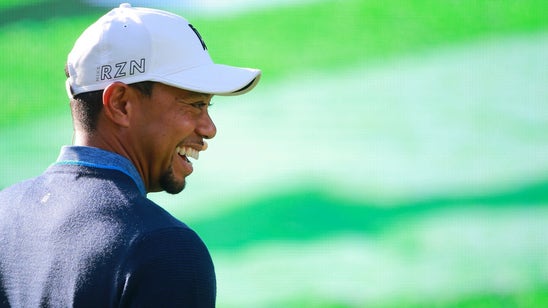 Tiger Woods is writing a book about his 1997 Masters win