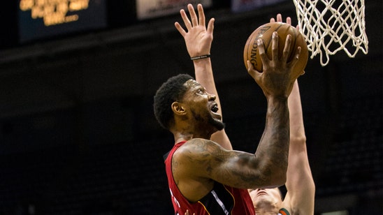 Report: Heat's Haslem buys new home for woman who raised him