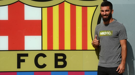 Turan looking forward to playing with Iniesta, Messi at Barcelona