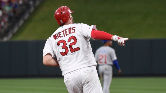Cards reclaim first in NL Central with Flaherty's one-hitter, 8-0 win over Cubs