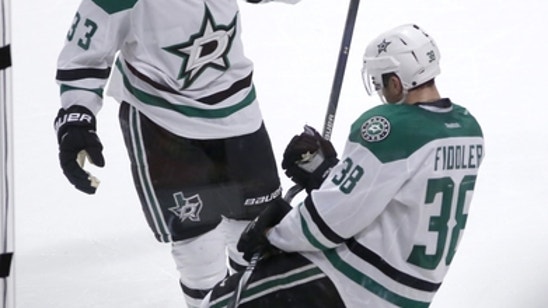 Stars clinch playoff spot with 6-2 victory over Blackhawks