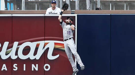 Arenado homers, Blackmon catch helps Rockies top Padres