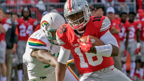 Meyer admits struggling with QB question after using both in win