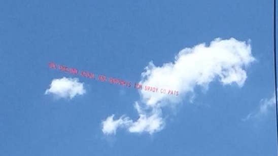 Rebuttal banner supporting Tom Brady flies over Pats practice