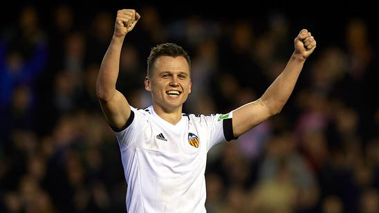 Valencia rally for late victory against Espanyol; Villarreal edge past Malaga