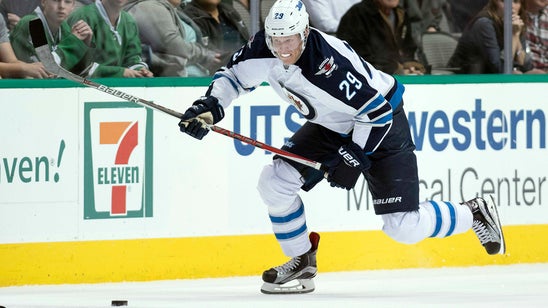 Coyotes look to put clamps on Jets rookie Laine