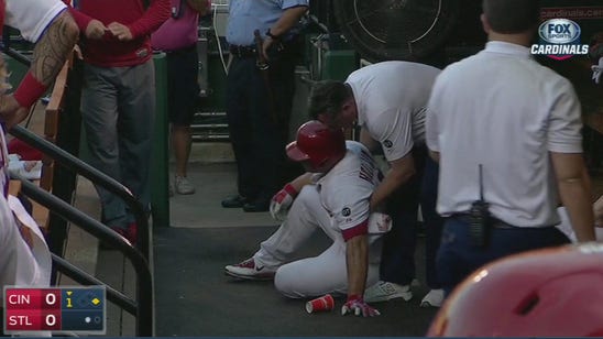 Cardinals OF Holliday leaves game with quad strain in first