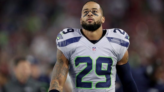 Earl Thomas flagged for hugging referee after TD (Video)