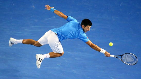 Djokovic dives into 25th Grand Slam semifinal, first as a father