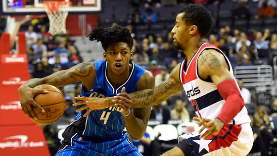 Magic withstand career night from John Wall to beat Wizards