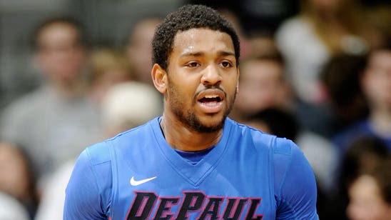 DePaul's Myke Henry sinks shot while riding a bicycle