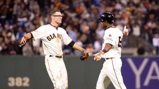 Hold the champagne: Giants beat Dodgers in 12, avoid elimination
