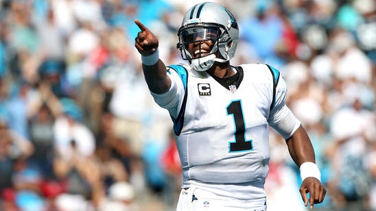 Cam Newton does it all -- with flair -- in takedown of Texans