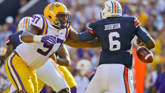 Auburn coaches not happy with QB Johnson, 'God awful' passing game