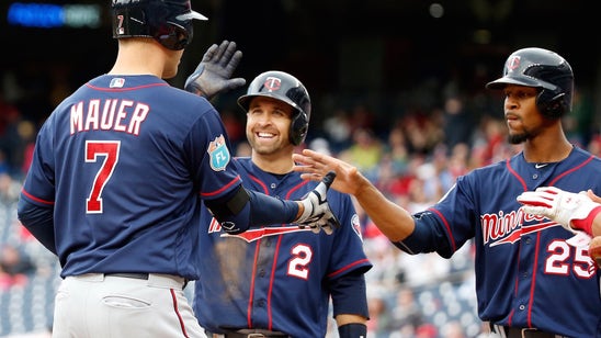 Mauer, Dozier homer as Twins tie Nationals 8-8