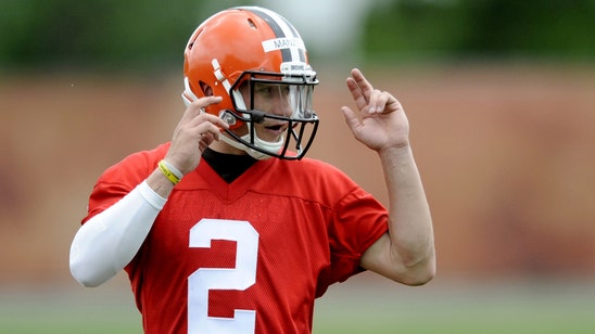 Manziel rests sore elbow; Pro Bowl tackle Thomas avoids knee injury