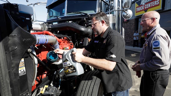 Tony Stewart changes oil on his No. 14 hauler